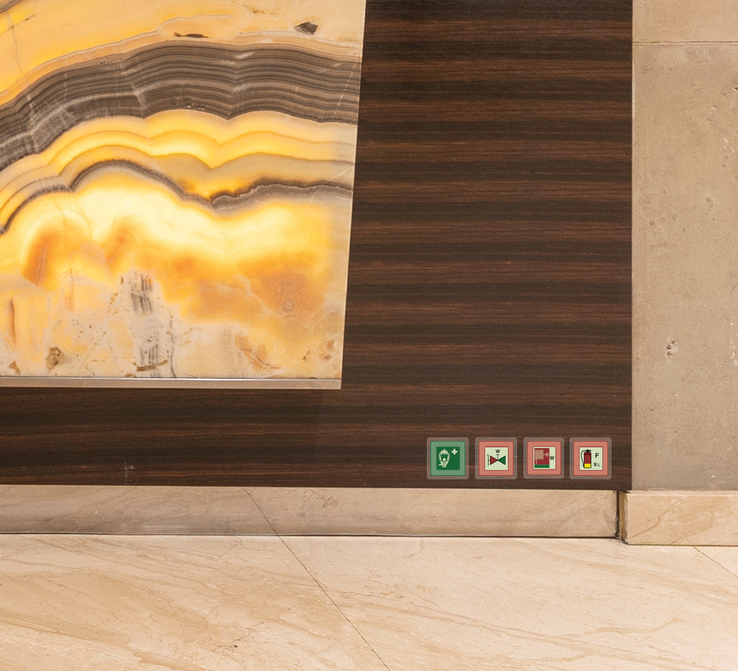 Everlux bespoke marine safety signs installed in a superyacht interior